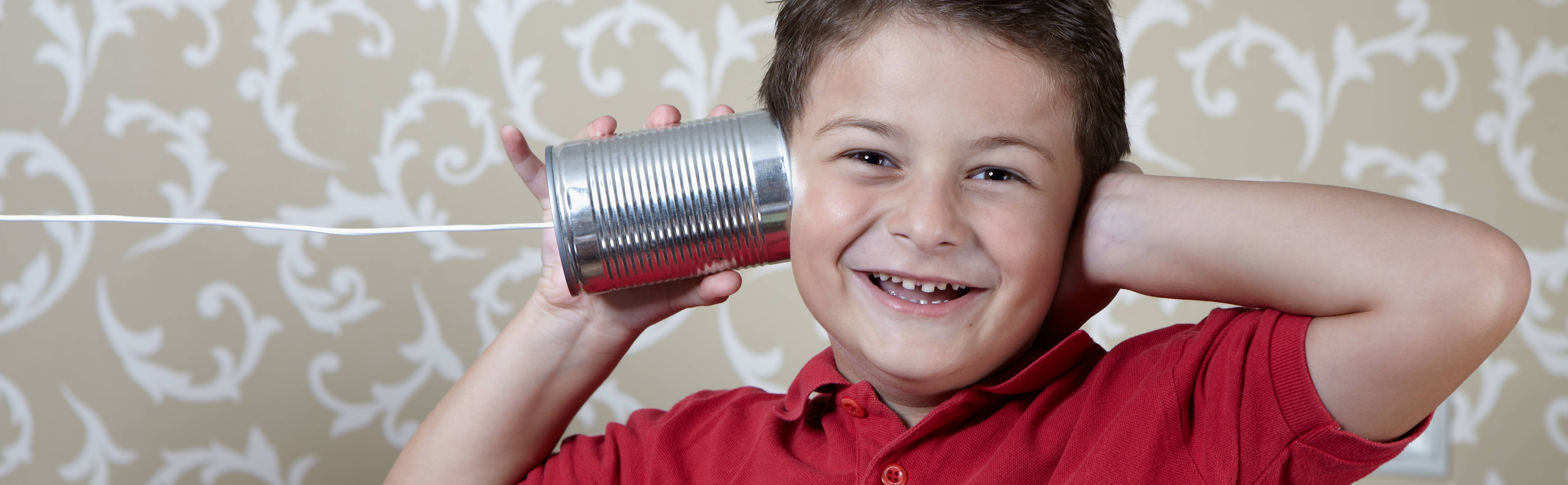 child with can phone